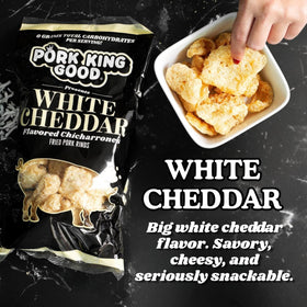 Pork King Good crispy pork rinds closeup, highlighting cheesy flavor for snacking.