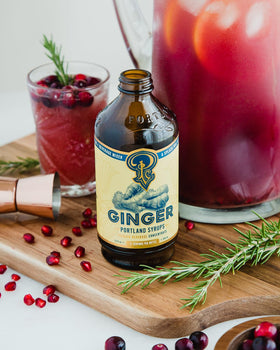 Ginger syrup stirred into sparkling water for a refreshing mocktail.