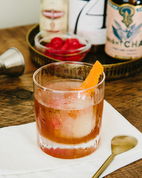 Portland Syrups Bright Chai Syrup mocktail glass highlighting sparkling spice