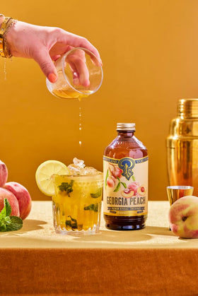 Portland Syrups Georgia Peach Syrup drizzled over desserts for a fruity finish.