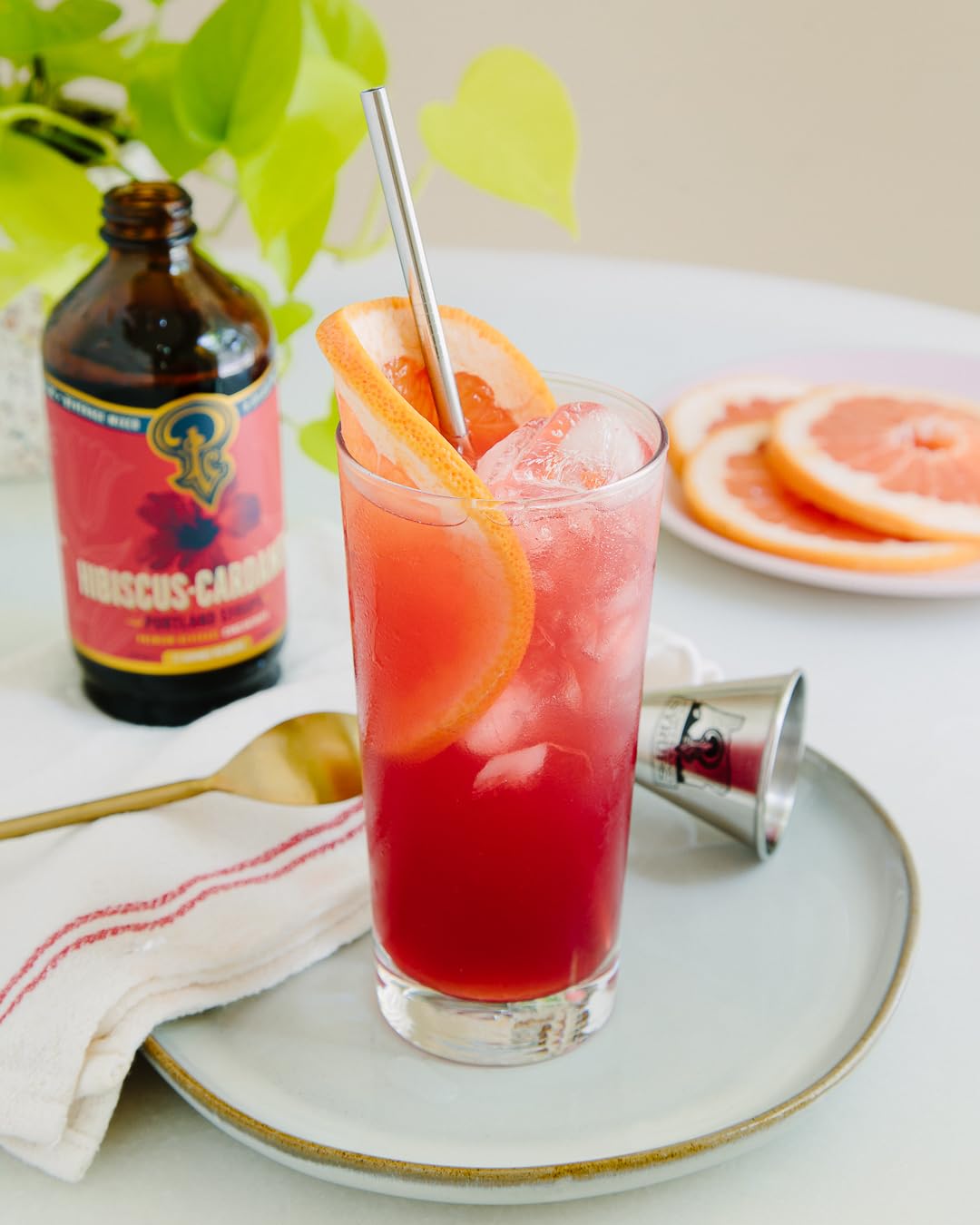 Portland Syrups Hibiscus Cardamom mocktail setup showcases vibrant aroma