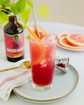 Portland Syrups Hibiscus Cardamom mocktail setup showcases vibrant aroma