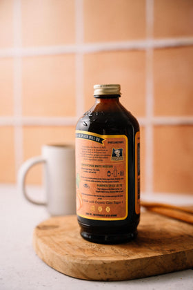 Portland Syrups Pumpkin Spice Syrup in a latte scene for cozy beverages.