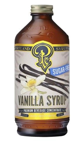 Portland Syrups Sugar-Free Vanilla bottle pours into coffee for a creamy vanilla experience.