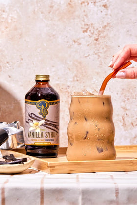 Portland Syrups Vanilla Syrup bottle with a dessert plate as finishing touch.