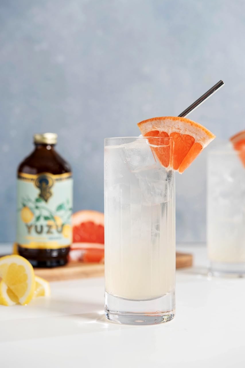Portland Syrups Yuzu cocktail glass highlighting citrus-flavored mix.
