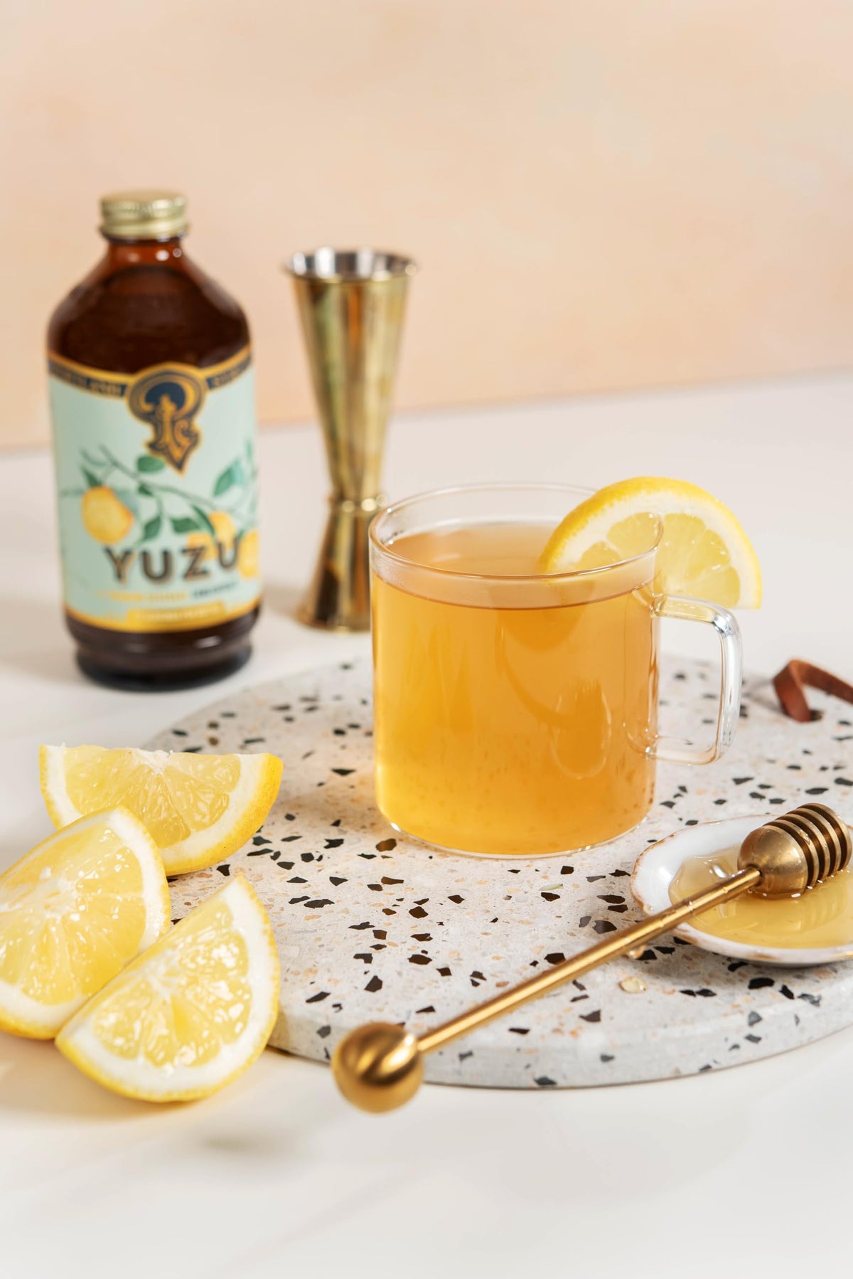 Portland Syrups Yuzu syrup coffee scene promotes citrus aroma in coffee.