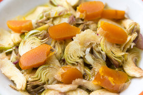 Poseidon Bottarga as a salad topping adding ocean brightness.