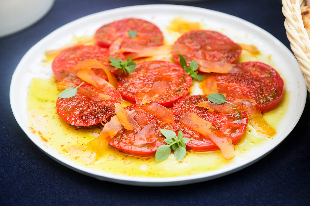 Poseidon Bottarga scrambled eggs with a luxurious savory accent.