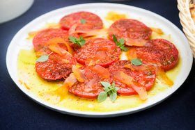 Poseidon Bottarga scrambled eggs with a luxurious savory accent.