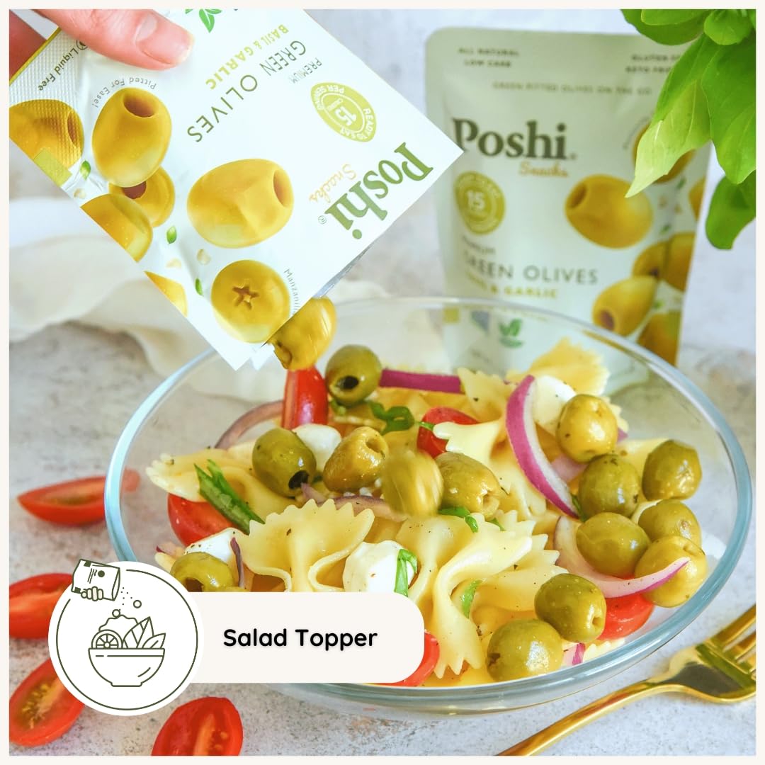 POSHI Green Olives Basil & Garlic on a charcuterie board.
