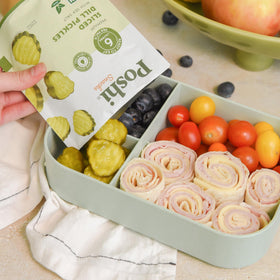 Poshi light packaging keeps dill pickle slices fresh while traveling