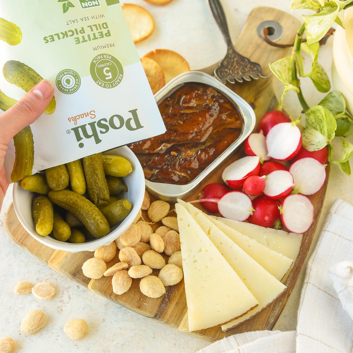 Poshi Petite Dill Pickles in a bowl illustrate a shareable home snack