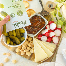 Poshi Petite Dill Pickles in a bowl illustrate a shareable home snack