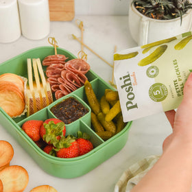 Poshi Petite Dill Pickles pack stack demonstrates pantry or lunchbox convenience