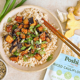 POSHI Riced Cauliflower on-the-go pack for travel-friendly meals.