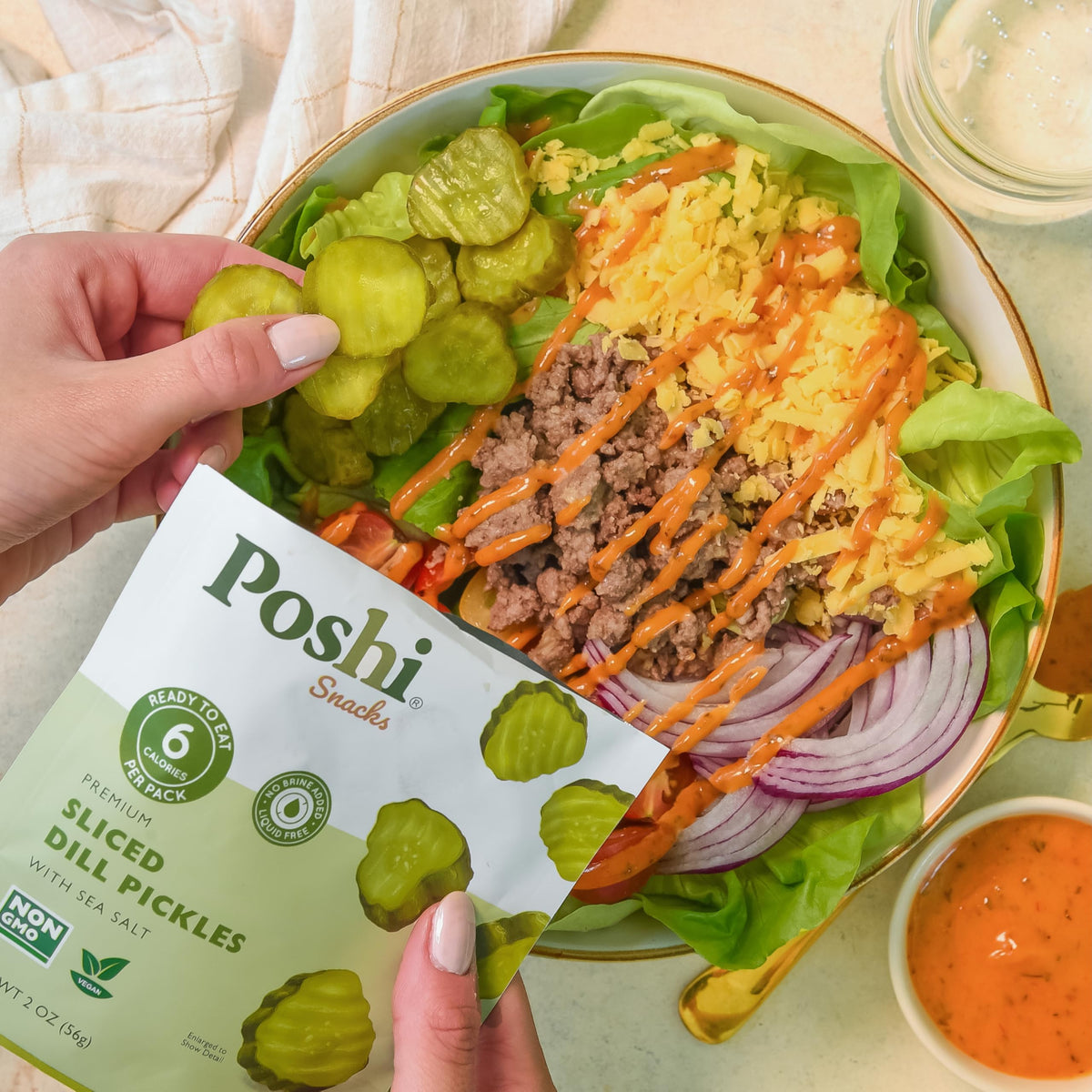 Poshi zero-sugar dill pickles offer a crisp, guilt-free crunch