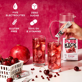 Pour one stick into water glass, showing quick mix and Blood Orange flavor.