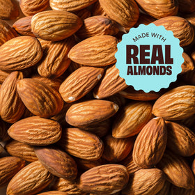 Pouring milk over Premier Protein chocolate almond cereal for a bowl.