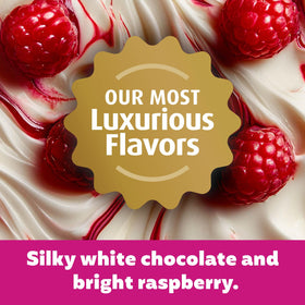 Premier Protein Indulgence White Chocolate Raspberry 12-pack box on shelf.