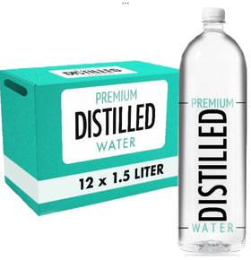 Premium Distilled Water bottle pour shows easy handling and controlled flow.