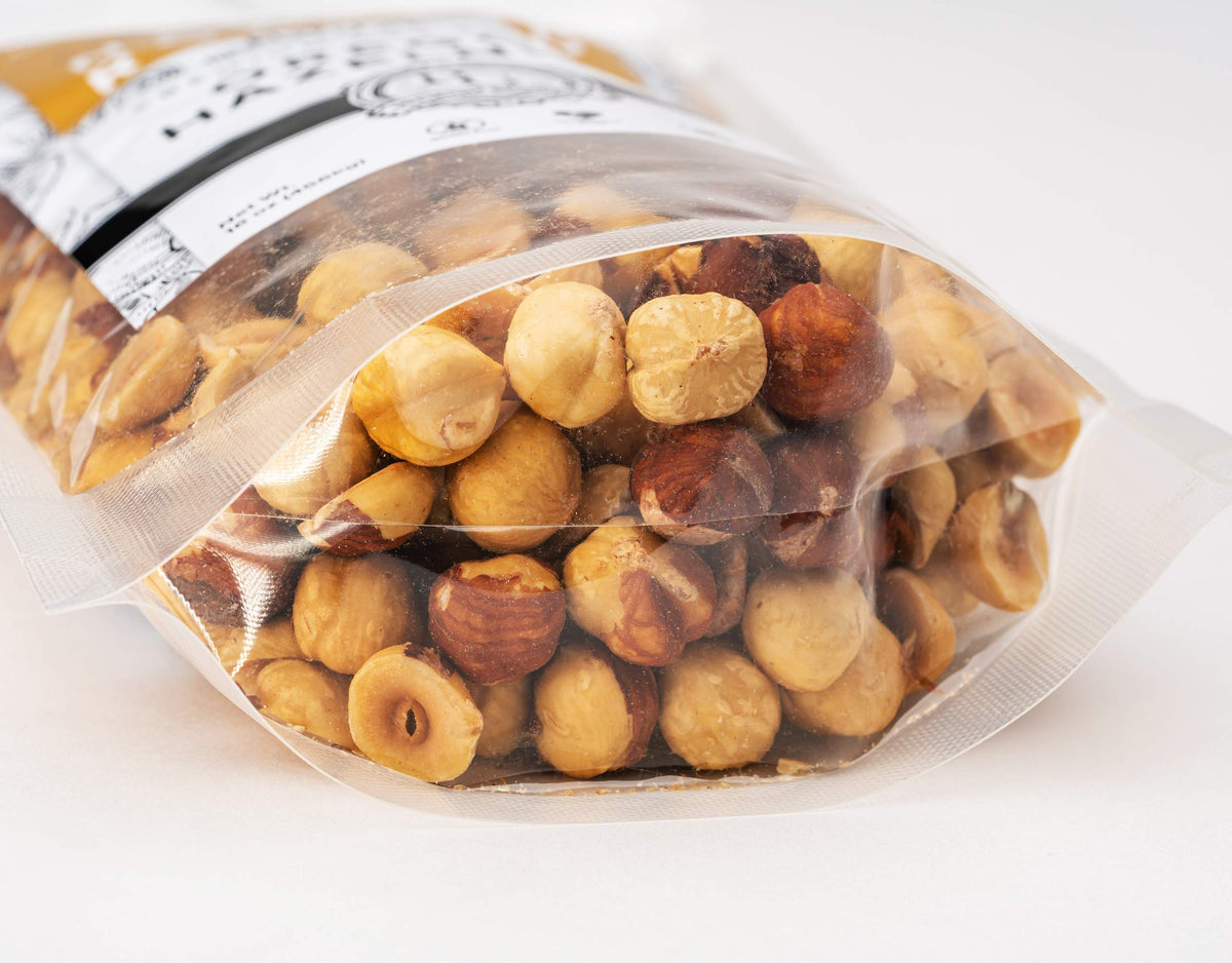 Premium Growers hazelnuts on a hiking pack, ideal portable energy.