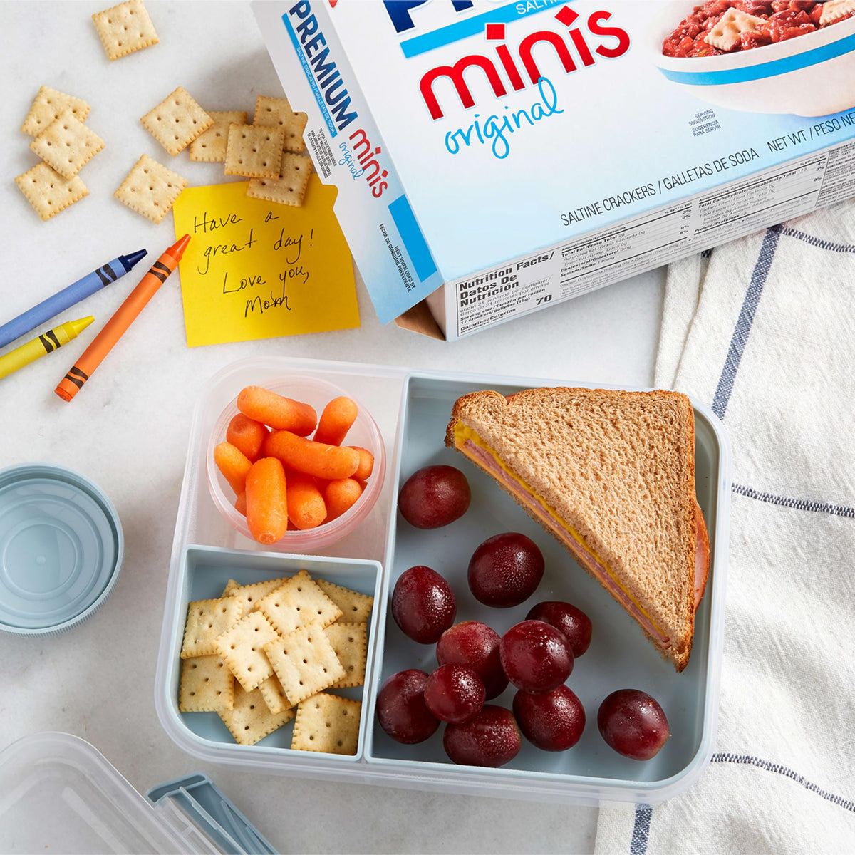 Topping ideas on a plate with mini crackers.