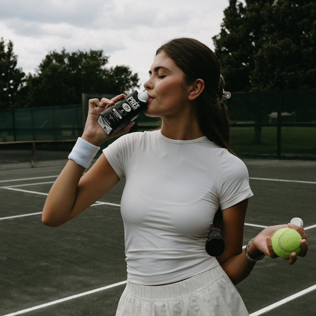 PRÉS ready-to-drink protein coffee in hand for busy mornings