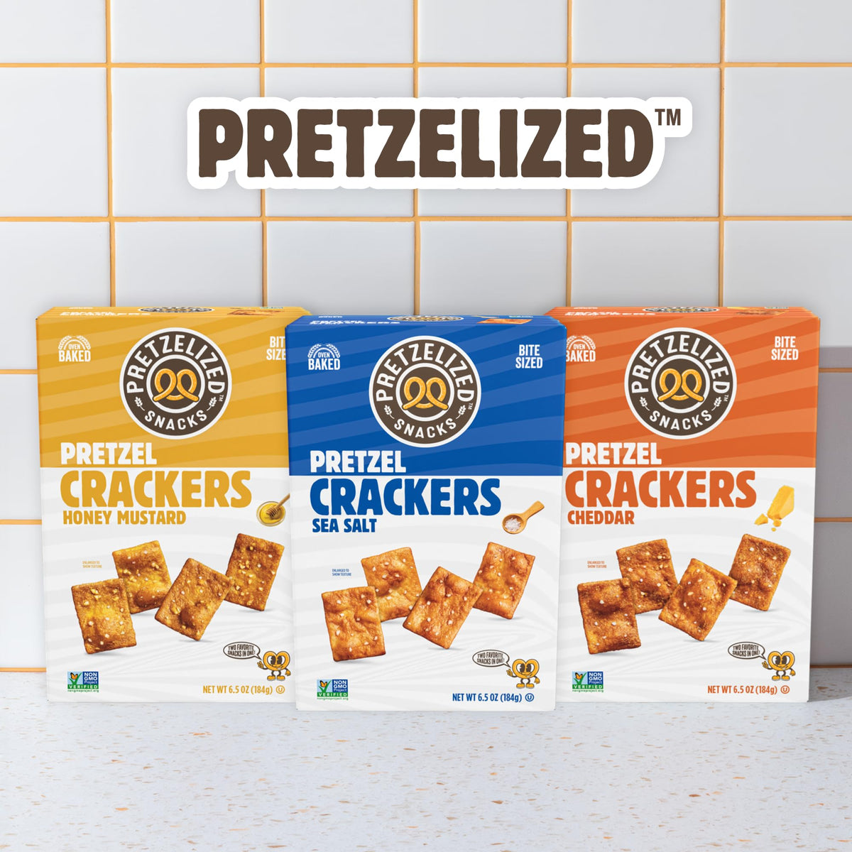 PRETZELIZED Snacks cheddar crackers close-up showing crisp cheese bite