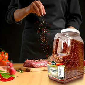 Prima Spice Crushed Red Pepper Flakes on stove adds flavor.