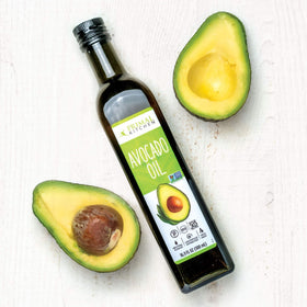 Primal Kitchen Avocado Oil pour demonstrating smooth texture for high-heat cooking.