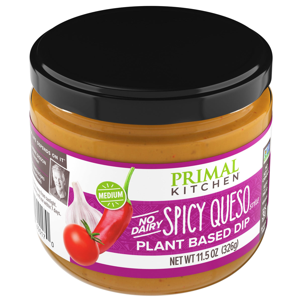 Primal Kitchen Dip Queso Spicy vegan label close-up signals dairy-free choice.