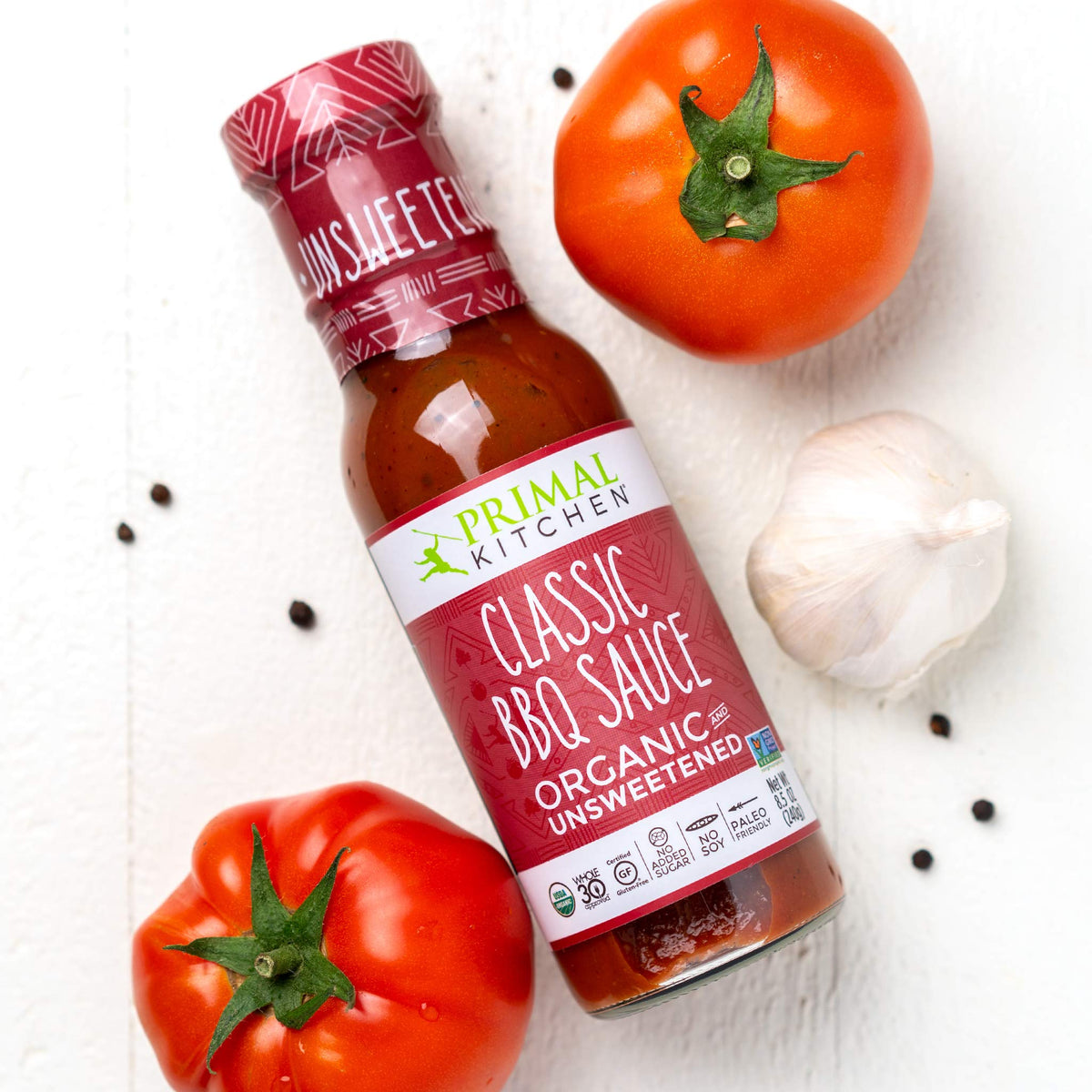 Primal Kitchen Golden BBQ sauce bottle for sunny, caramelized flavor without cane sugar.