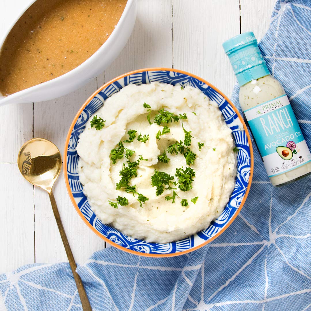 Primal Kitchen Greek marinade using dressing for flavorful chicken