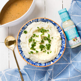 Primal Kitchen Greek marinade using dressing for flavorful chicken