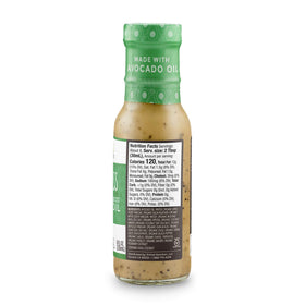 Primal Kitchen Green Goddess dressing dip with veggie sticks, versatile snack option.