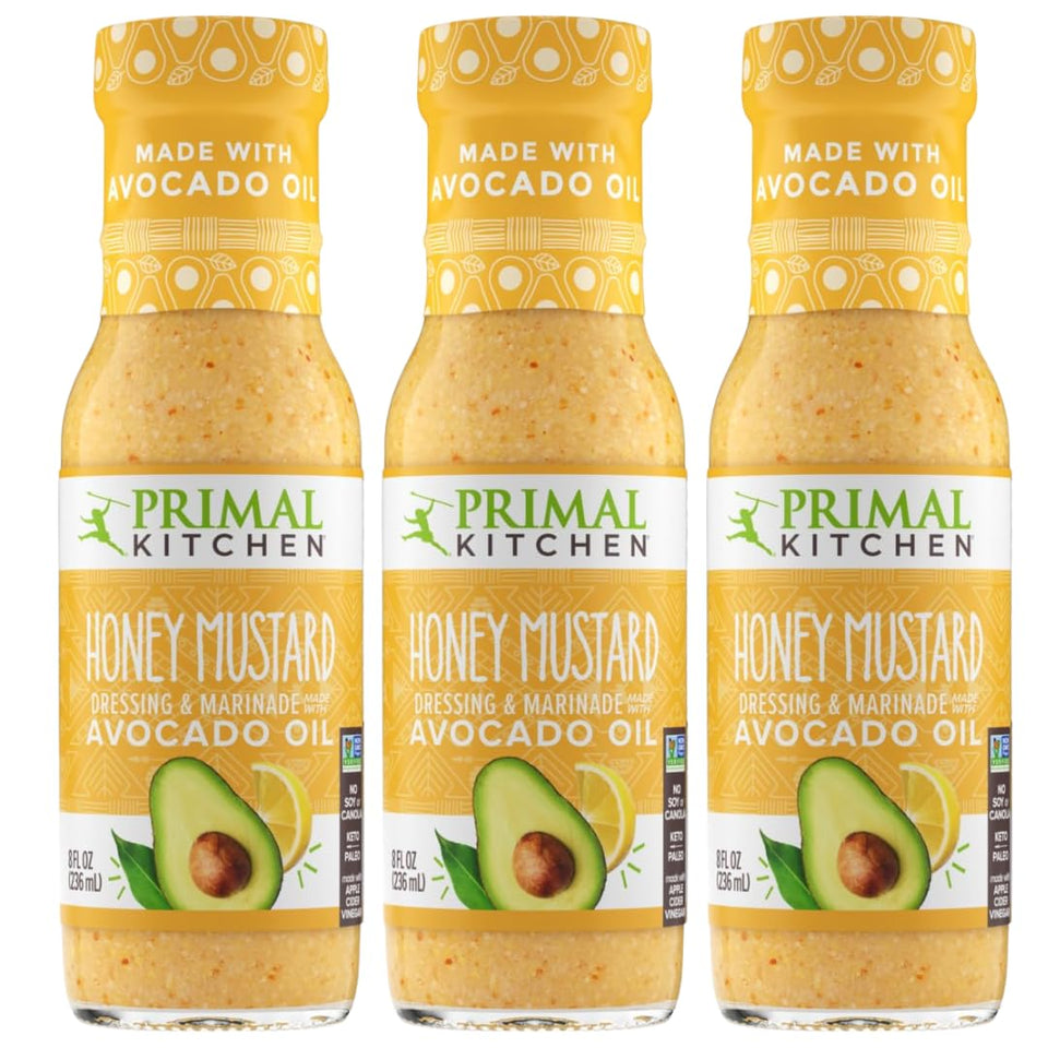 Primal Kitchen Honey Mustard Vinaigrette bottle pour for smooth, even salad coating