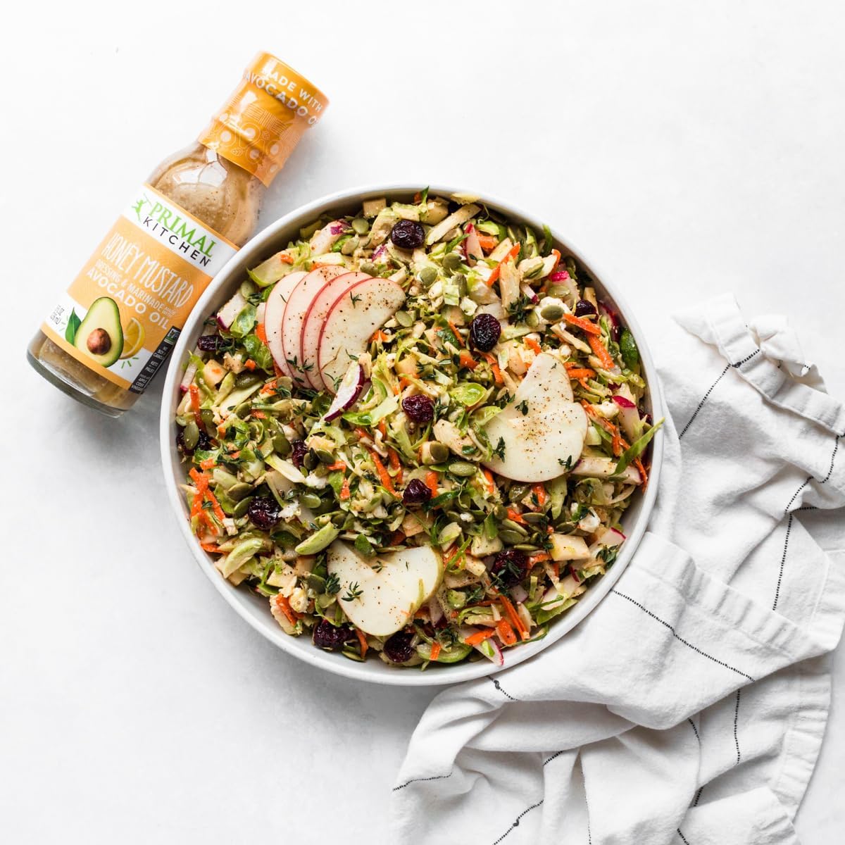 Primal Kitchen Honey Mustard Vinaigrette meal prep pour supports quick lunches