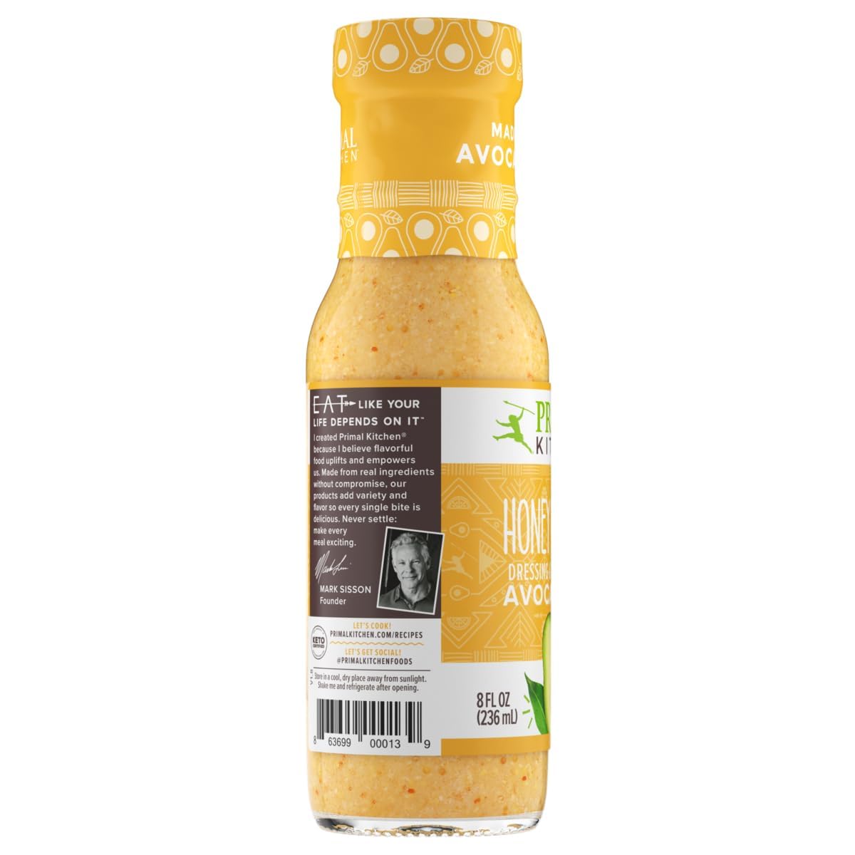 Primal Kitchen Honey Mustard Vinaigrette in a bowl adds balanced flavor to greens
