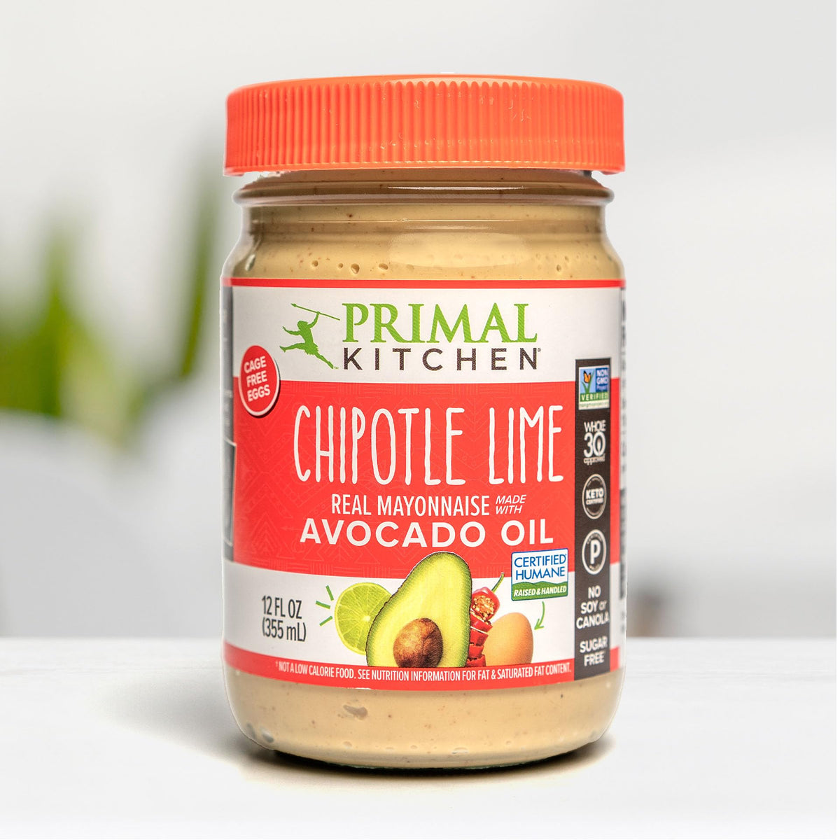 Primal Kitchen mayo label close-up, highlighting avocado oil and clean ingredients.