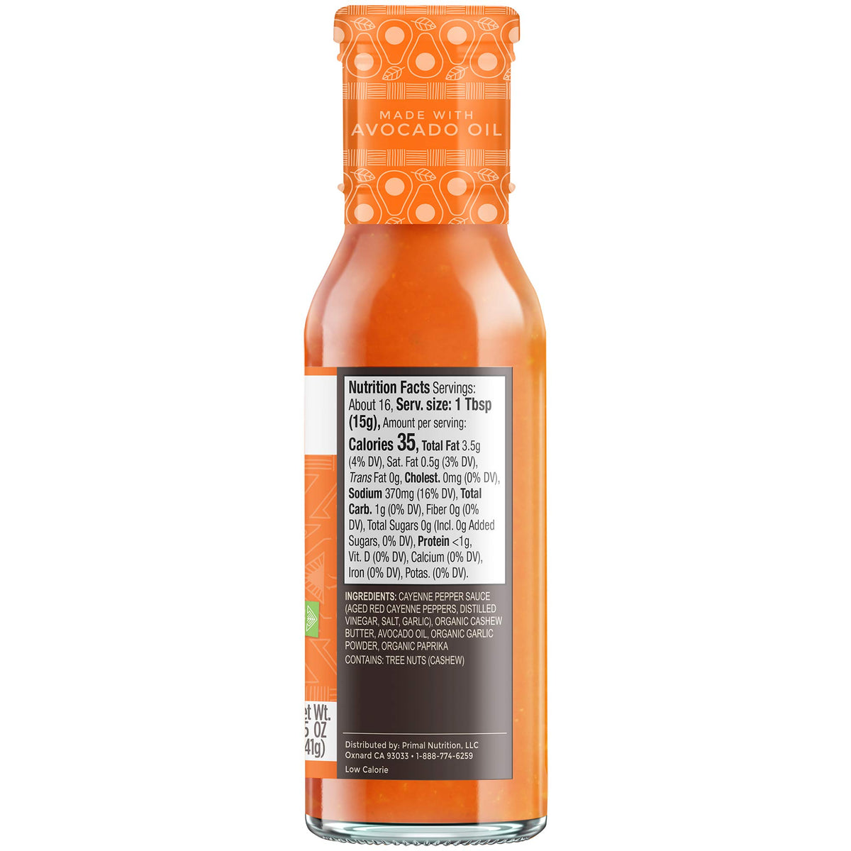 Primal Kitchen Buffalo Sauce pour over wings showing medium heat without dairy or sugar