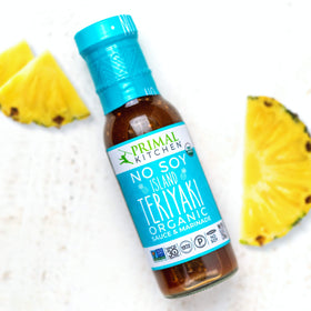 Primal Kitchen No-Soy Island Teriyaki bottle glaze emphasizes pineapple notes for dipping and glazing.
