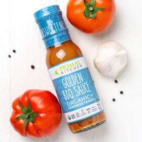 Primal Kitchen Original BBQ sauce grilling scene for juicy veggies and meats.