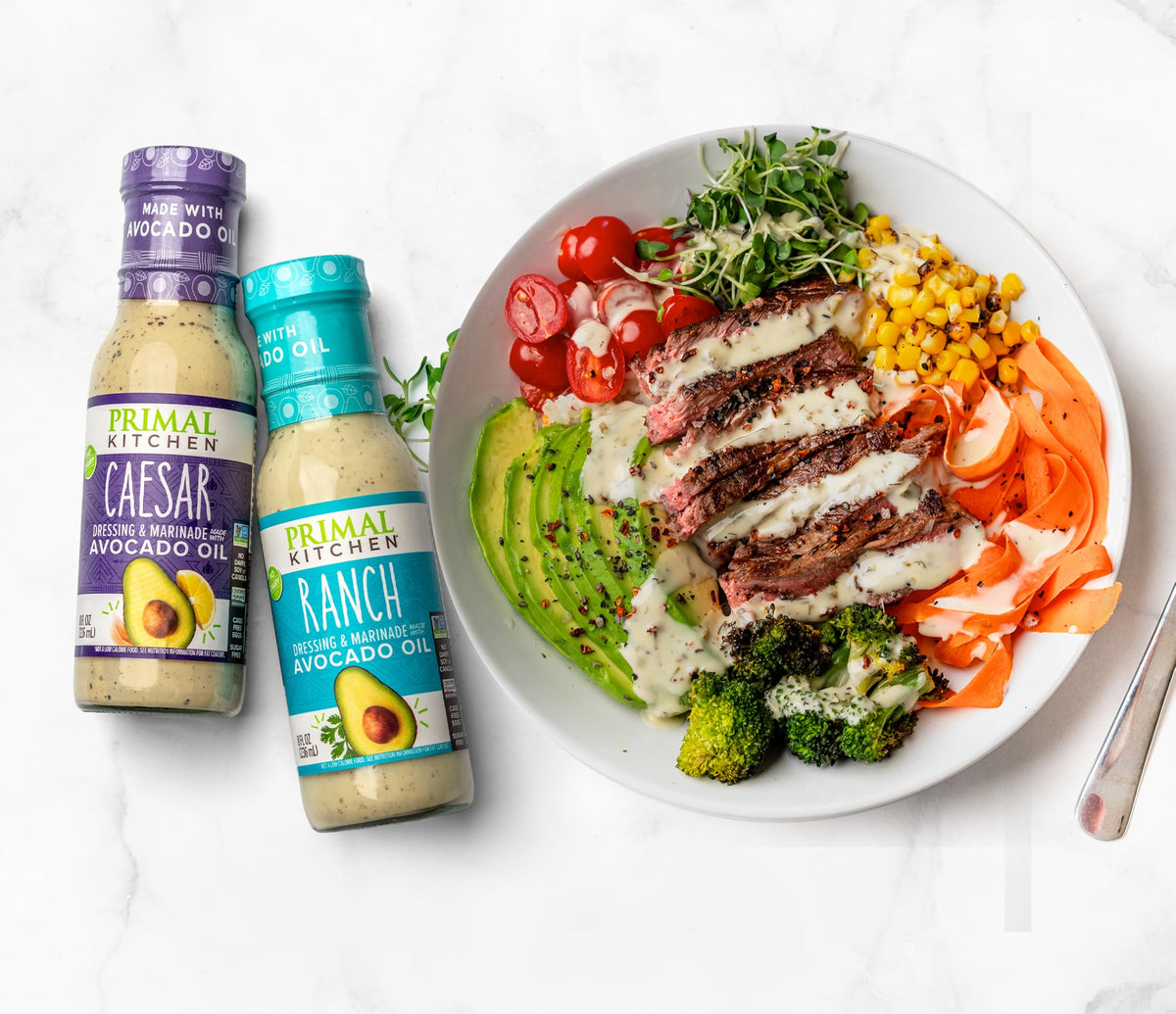 Primal Kitchen Ranch and Caesar duo variety pack on counter