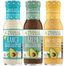 Primal Kitchen Ranch dressing bottle pour for creamy salads