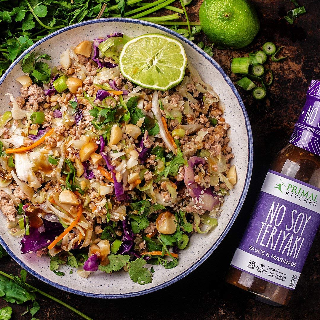Primal Kitchen teriyaki ingredients closeup emphasizes coconut aminos and date paste for real flavor.
