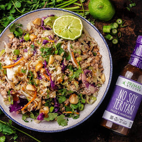 Primal Kitchen teriyaki ingredients closeup emphasizes coconut aminos and date paste for real flavor.