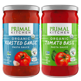 Primal Kitchen Tomato Basil Marinara bottle on countertop; sugar-free and gluten-free.