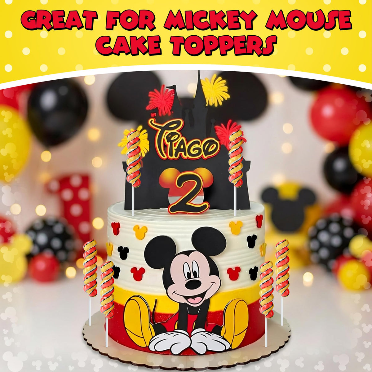 Mickey birthday dessert table with colorful swirl lollipops.
