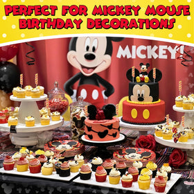 Mickey-themed party favors featuring Primary Colors Candy lollipops.